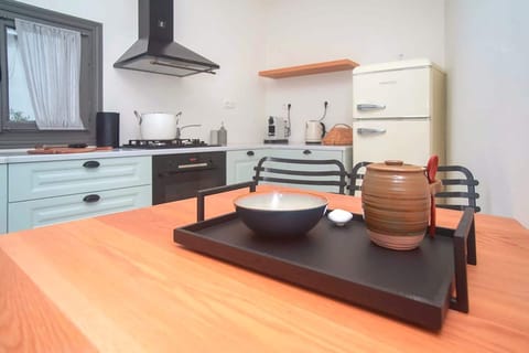 Kitchen with full equipment and dining space