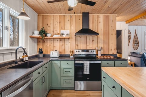 Kitchen with microwave, air fryer, crock pot, blender, toaster and more 