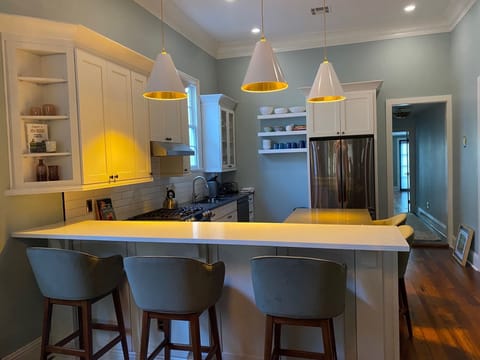 Updated kitchen with bar height (x3) and counter height (x2) seating