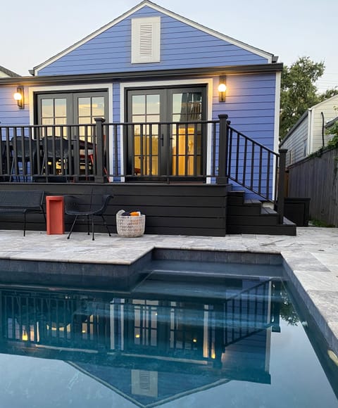 Backyard pool and deck (pool is unheated which is comfortable much of the year)