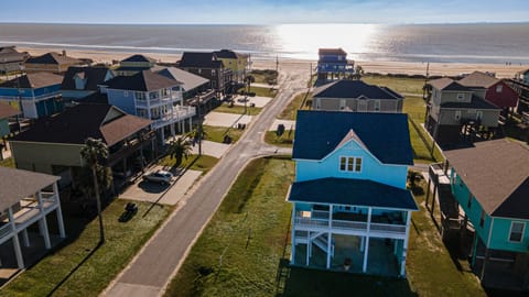 This beautiful house is steps away from the sand!