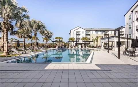 Plunge into the resort style pool.