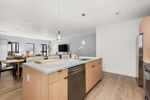 Open kitchen with lots of stocked amenities
