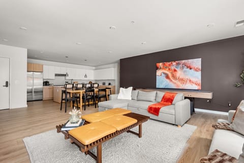 Open concept living room, dining area, and kitchen