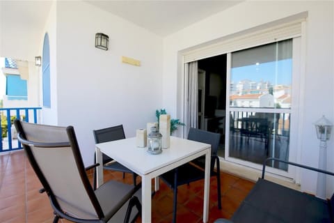 Outdoor dining area for four guests on the private terrace