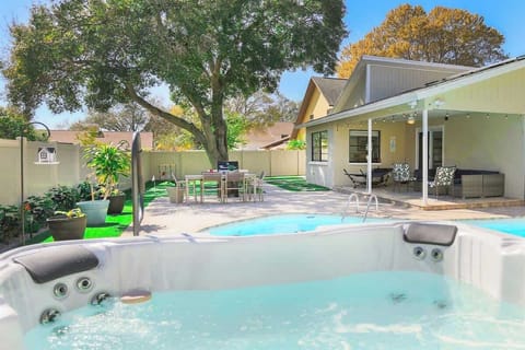 Enjoy the hot tub and the pool in Snook Haven, our vacation rental home in Largo, Florida. 