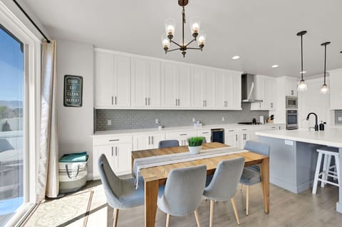 Dining area. Towels left in the corner for private jacuzzi just right outside