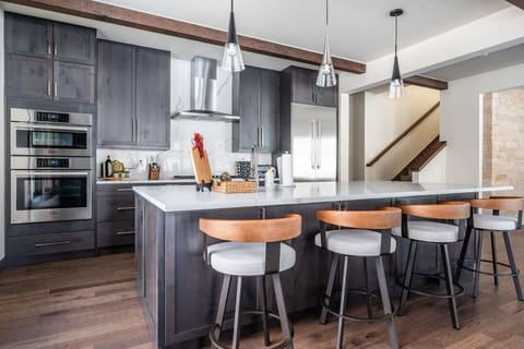 Kitchen with oven and microwave