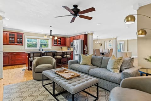 Stay connected in this open living area with kitchen bar seating.