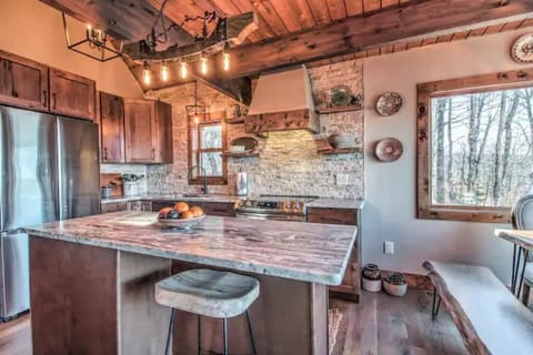 The hood has been made from a reclaimed barn piece of wood - 300 years old!