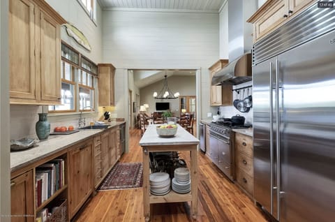 Fully stocked kitchen, two ovens, propane cook top, built in ice maker