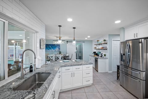Whip up your favorite dishes in this fully stocked kitchen with premium finishes and a clean, contemporary design.