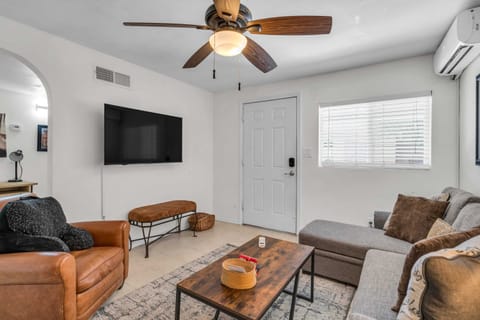 Please note: The living room furniture has since been updated and now features two comfortable red loveseats instead of the sectional shown in this photo.