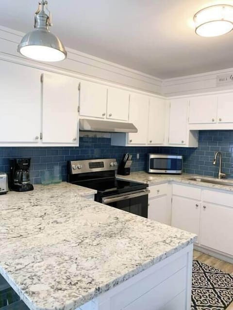 Fully equipped kitchen with stainless steel appliances and all the essentials for cooking an amazing meal!