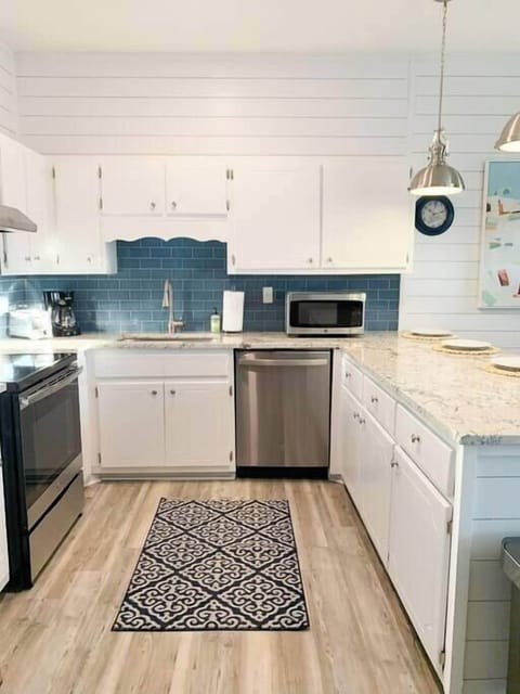 Fully equipped kitchen with stainless steel appliances and all the essentials for cooking an amazing meal!