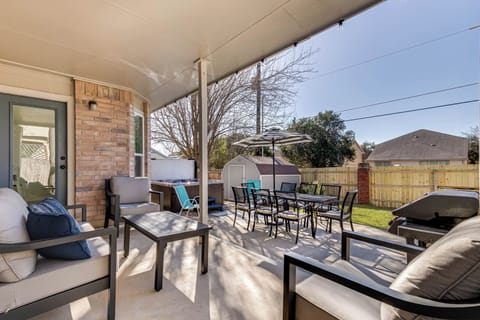 Shaded, comfy seating for coffee & sunsets. Hot tub. Weber BBQ. Table & 8 chairs
