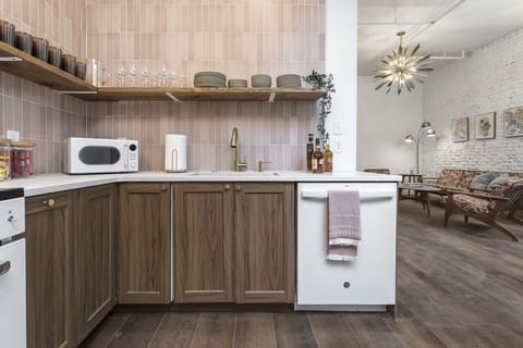 Kitchen with basic cookware and utensils. Comes with cups and glasses and plates. Complimentary breakfast includes custom hollyhock blend coffee from local roaster, k-cups, and tea. Breakfast bars, oatmeal, and popcorn are there for your enjoyment!