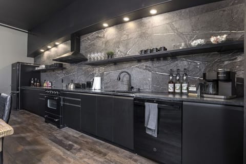 Another view of our kitchen! Lots of cookwares and utensils. Coffe and tea bar with custom local quills coffee blend!