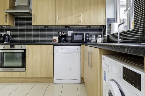 Cook up your favorite dishes in a well-lit kitchen that feels just like home.
