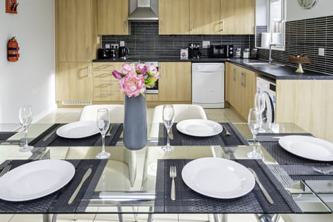 Bright and cozy dining space designed for memorable meals and quality time.
