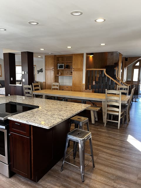 Prep and serving space in kitchen and adjoining dining area.