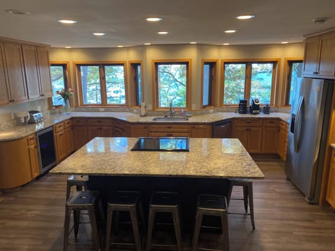 Well-stocked, Spacious, Open-concept “Gourmet/Chef’s” kitchen.