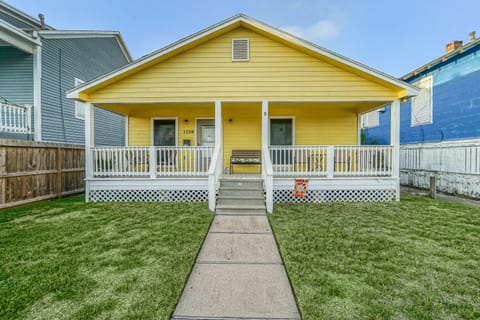 What an inviting front porch to hang out and relax!