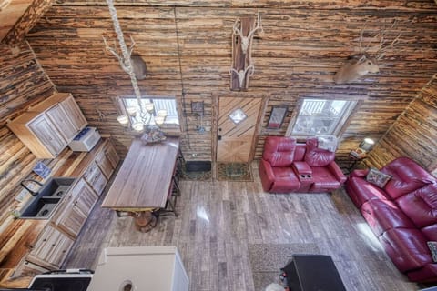 Dining area and living space with vaulted ceilings, rustic décor, and plenty of room to gather.