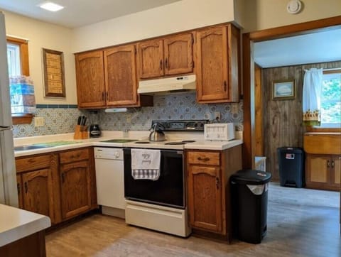 Kitchen leads to laundry room on main floor 