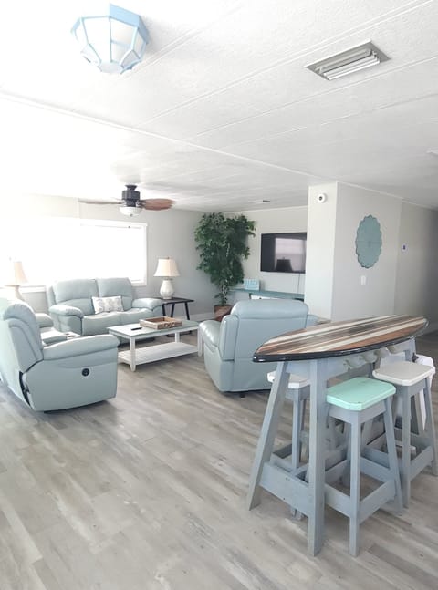 Living Room and Surfboard Dining Area