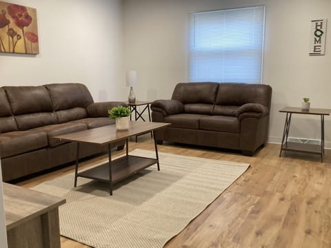Nice spacious living room with comfy sofas