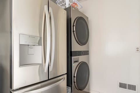 Large fridge and GE washtower