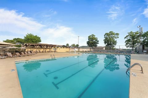 Relax around the pool that is right across the street