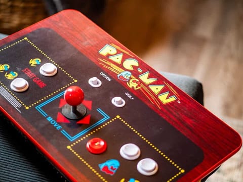 Begin your gaming adventure in our lively game corner. Located  in the tv cabinet in the living room