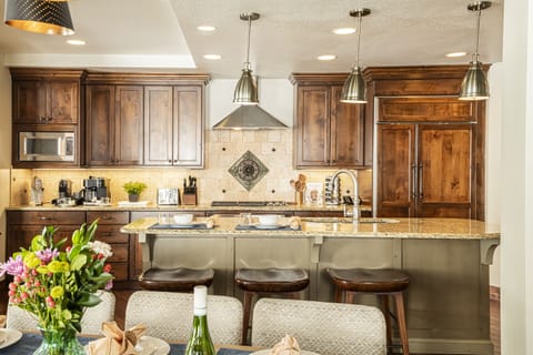 Kitchen island with bar seating for three