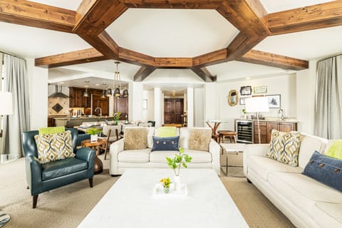 Main living area offering wet bar equipped with a wine fridge
