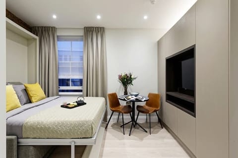 Comfortable double mattress on wall bed. Latest technology system, easy to use and space efficient to enjoy as much as possible your stay. The bed will be ready for your arrival.