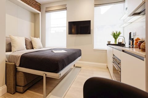 Comfortable wall bed. Latest technology system, easy to use and space efficient to enjoy as much as possible your stay. The bed will be ready for your arrival.