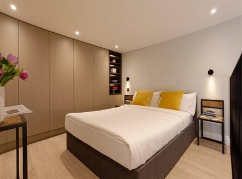 On the top floor you will find a comfortable double bed, and a huge wardrobe + a second smart TV.