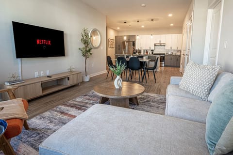 Make yourself at home in our spacious living room adorned with stylish and modern furniture.