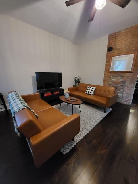 Living room with TV and 2 fold down sleeper sofas