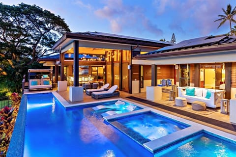 Private pool and hot tub and spacious outdoor dining and lounge areas, including a new wellness area.