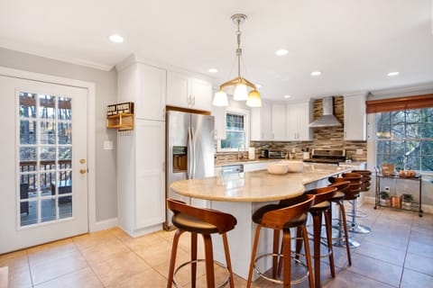 The kitchen with door to the deck