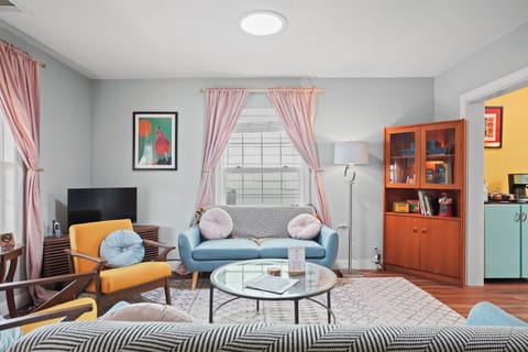 Unwind in this cozy, stylish living space, complete with a smart TV, games and puzzles, and a warm, inviting ambiance.