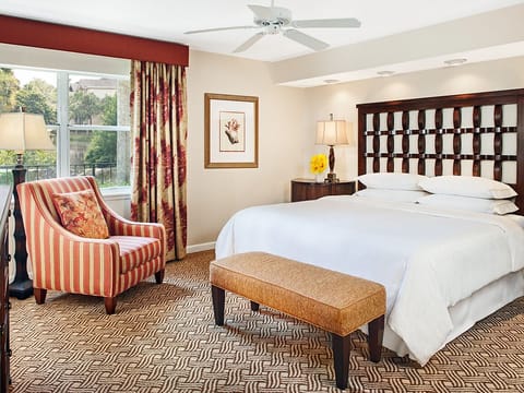 Rest and recharge in our cozy bedroom. Please note that photos may vary depending on room assignment.