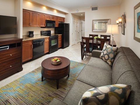 Experience the convenience of an open-concept design, where the living room, dining area, and kitchen come together in one spacious setting for comfort and connection.