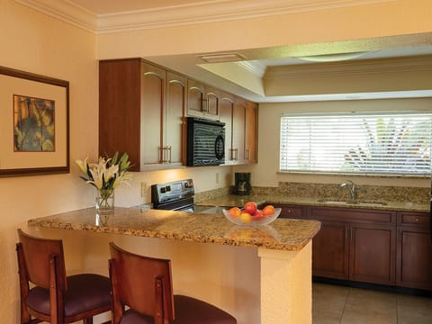 Cook and create in our fully equipped kitchen. Please note that photos may vary depending on the specific room assignment.