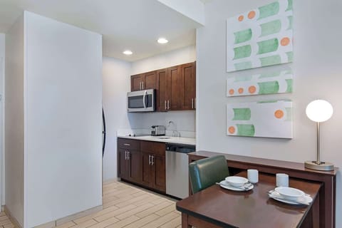 Prep snacks comfortably with generous counters and modern appliances.