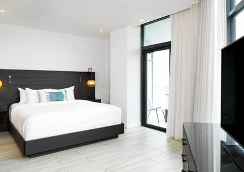 Wake to sunlit serenity and step onto your private balcony.