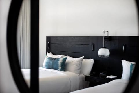 Relax in a quiet bedroom designed for deep, restful sleep.